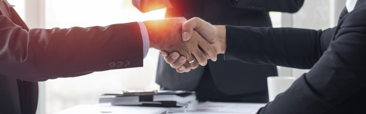 Professional team in a corporate setting, symbolising trusted family office services tailored for high-net-worth clients in Asia.